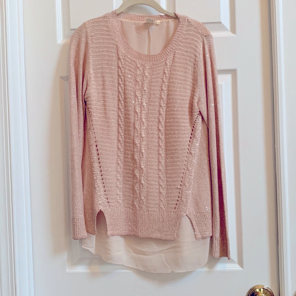 Women very lightweight sequins top. Dressy.